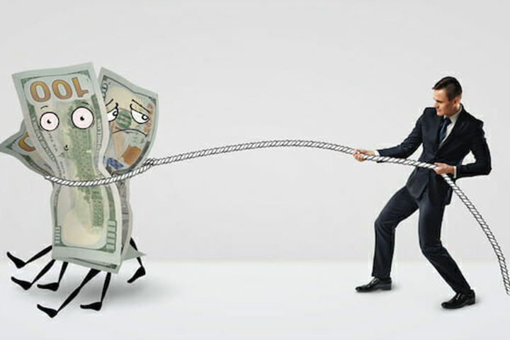 man lassoing 100 dollar bills