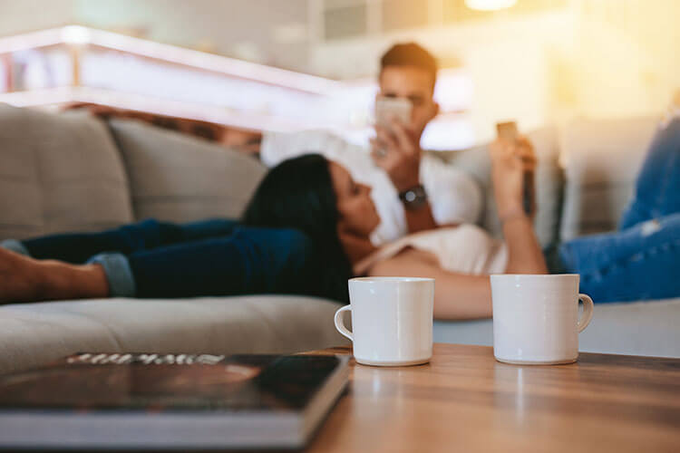 Couple lying on the couch together