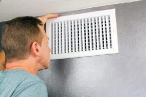 checking vent for HVAC bad odor